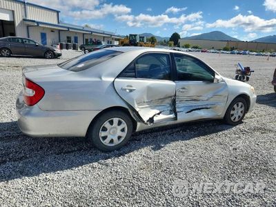 Trzecie zdjęcie samochodu z tyłu: 2002 TOYOTA CAMRY LE VIN:4T1BE32K42U058050 - miniatura