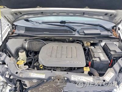 Zdjęcie 12 z 13 samochodu: 2012 DODGE GRAND CARAVAN SE VIN:2C4RDGBG1CR380300 - miniatura