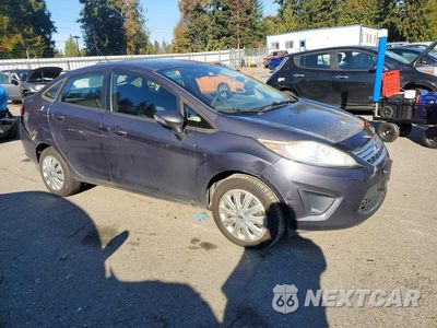 Czwarte zdjęcie samochodu z boku: 2013 FORD FIESTA SE VIN:3FADP4BJ7DM215068 - miniatura