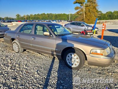 Czwarte zdjęcie samochodu z boku: 2004 MERCURY GRAND MARQUIS GS VIN:2MEFM74W84X661111 - miniatura