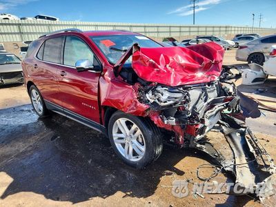 Czwarte zdjęcie samochodu z boku: 2018 CHEVROLET EQUINOX PREMIER VIN:2GNAXMEV2J6228139 - miniatura