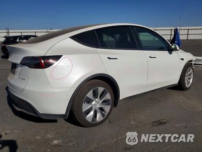 Trzecie zdjęcie samochodu z tyłu: 2022 TESLA MODEL Y VIN:7SAYGAEE9NF490751 - miniatura