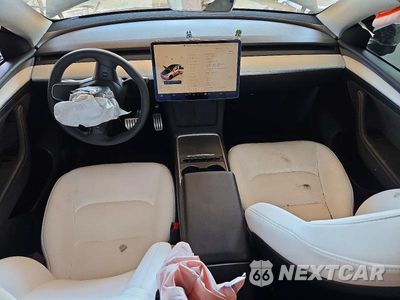 Zdjęcie 8 z 12 samochodu: 2024 TESLA MODEL Y VIN:7SAYGDEF5RF161965 - miniatura