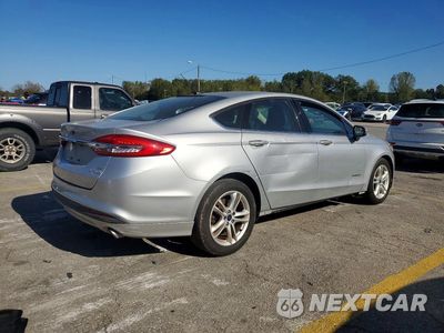 Trzecie zdjęcie samochodu z tyłu: 2018 FORD FUSION SE HYBRID VIN:3FA6P0LU1JR195036 - miniatura