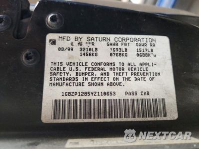 Zdjęcie 12 z 12 samochodu: 2000 SATURN SC1 VIN:1G8ZP1285YZ110653 - miniatura