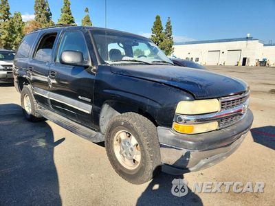 Czwarte zdjęcie samochodu z boku: 2002 CHEVROLET TAHOE C1500 VIN:1GNEC13V92R324709 - miniatura
