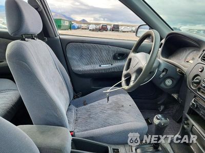 Zdjęcie 7 z 11 samochodu: 2000 MITSUBISHI MIRAGE DE VIN:JA3AY26C4YU060134 - miniatura