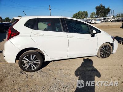 Trzecie zdjęcie samochodu z tyłu: 2018 HONDA FIT EX VIN:3HGGK5H81JM713151 - miniatura