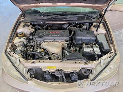 Zdjęcie 11 z 13 samochodu: 2002 TOYOTA CAMRY XLE VIN:4T1BE30K12U013506 - miniatura