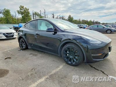 Czwarte zdjęcie samochodu z boku: 2024 TESLA MODEL Y VIN:7SAYGDEE5RA295881 - miniatura