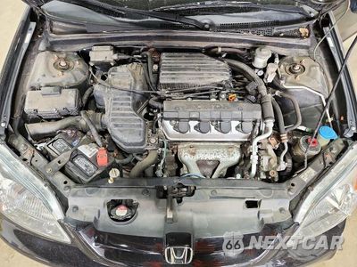 Zdjęcie 11 z 12 samochodu: 2001 HONDA CIVIC LX VIN:1HGEM21541L105321 - miniatura