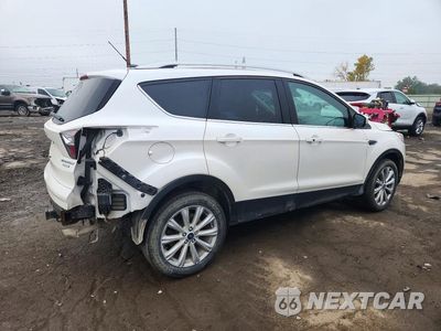 Trzecie zdjęcie samochodu z tyłu: 2017 FORD ESCAPE TITANIUM VIN:1FMCU9J95HUD09417 - miniatura