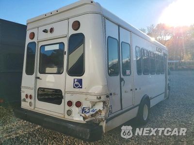 Czwarte zdjęcie samochodu z boku: 2023 FORD E450 SHUTTLE BUS VIN:1FDFE4FN6PDD27636 - miniatura