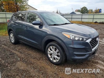 Czwarte zdjęcie samochodu z boku: 2019 HYUNDAI TUCSON SE VIN:KM8J2CA48KU080186 - miniatura
