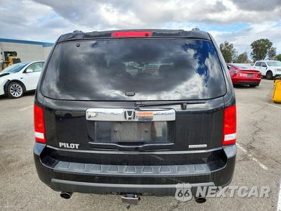 Zdjęcie 6 z 13 samochodu: 2011 HONDA PILOT TOURING VIN:5FNYF3H93BB047405 - miniatura