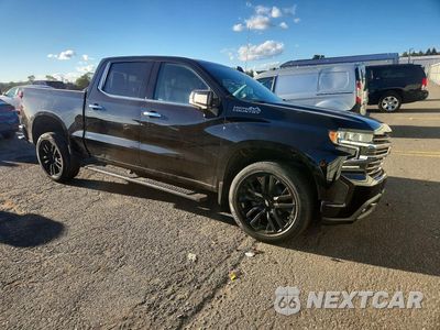 Czwarte zdjęcie samochodu z boku: 2021 CHEVROLET SILVERADO K1500 HIGH COUNTRY VIN:3GCUYHEL2MG141794 - miniatura