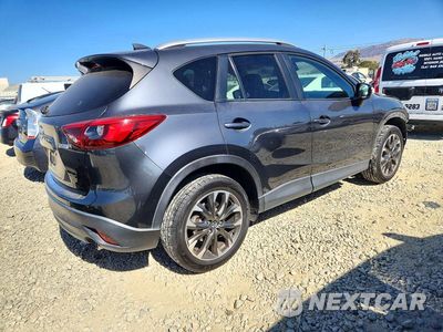 Trzecie zdjęcie samochodu z tyłu: 2016 MAZDA CX-5 GT VIN:JM3KE4DY0G0616283 - miniatura
