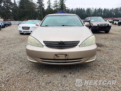 Piąte zdjęcie samochodu w środku: 2003 TOYOTA CAMRY LE VIN:4T1BE32K53U776272 - miniatura