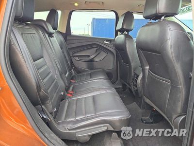 Zdjęcie 11 z 13 samochodu: 2017 FORD ESCAPE TITANIUM VIN:1FMCU9J99HUA47899 - miniatura