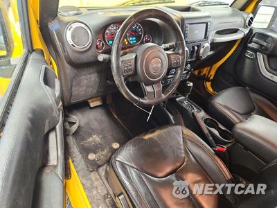 Zdjęcie 8 z 13 samochodu: 2015 JEEP WRANGLER SAHARA VIN:1C4GJWBG8FL538803 - miniatura