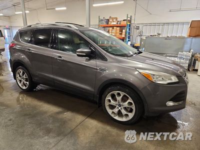 Czwarte zdjęcie samochodu z boku: 2014 FORD ESCAPE TITANIUM VIN:1FMCU9J93EUA74835 - miniatura