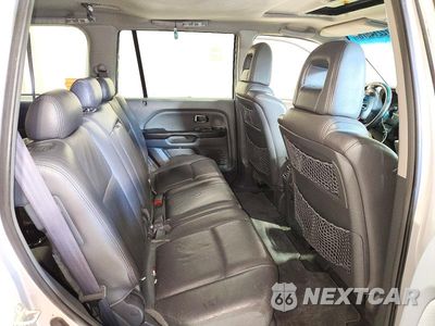 Zdjęcie 11 z 13 samochodu: 2005 HONDA PILOT EXL VIN:2HKYF18595H001665 - miniatura