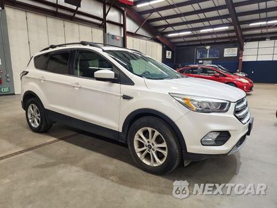 Czwarte zdjęcie samochodu z boku: 2018 FORD ESCAPE SEL VIN:1FMCU9HD0JUB57997 - miniatura