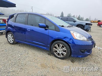 Czwarte zdjęcie samochodu z boku: 2010 HONDA FIT SPORT VIN:JHMGE8H40AS009260 - miniatura