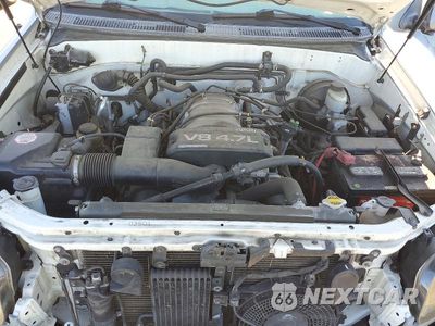 Zdjęcie 12 z 13 samochodu: 2002 TOYOTA SEQUOIA SR5 VIN:5TDBT44A82S104357 - miniatura