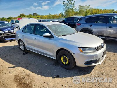Czwarte zdjęcie samochodu z boku: 2014 VOLKSWAGEN JETTA VIN:3VWD17AJ9EM285135 - miniatura