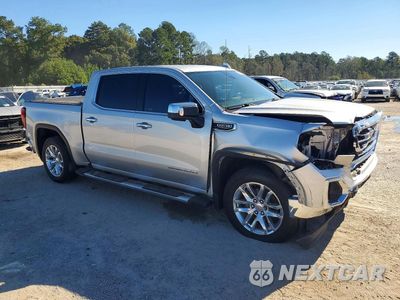 Czwarte zdjęcie samochodu z boku: 2019 GMC SIERRA C1500 SLT VIN:3GTP8DED1KG311185 - miniatura