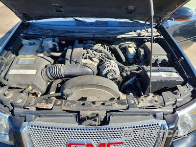 Zdjęcie 12 z 13 samochodu: 2005 GMC ENVOY DENALI XL VIN:1GKET66M956197687 - miniatura