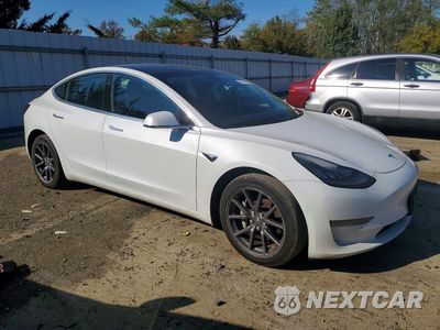 Czwarte zdjęcie samochodu z boku: 2019 TESLA MODEL 3 VIN:5YJ3E1EBXKF433246 - miniatura