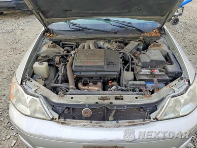 Zdjęcie 11 z 12 samochodu: 2002 TOYOTA AVALON XL VIN:4T1BF28B52U212621 - miniatura