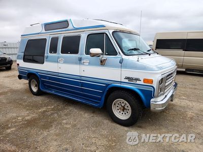 Czwarte zdjęcie samochodu z boku: 1991 CHEVROLET G20 VIN:1GBEG25KXM7132370 - miniatura
