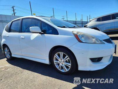 Czwarte zdjęcie samochodu z boku: 2010 HONDA FIT SPORT VIN:JHMGE8H44AC030431 - miniatura