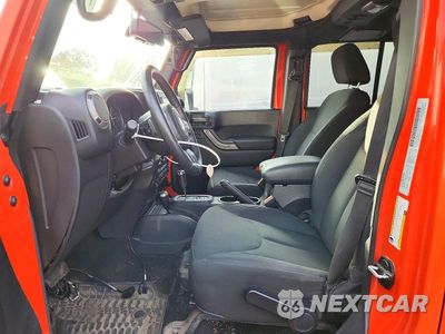 Zdjęcie 7 z 12 samochodu: 2015 JEEP WRANGLER UNLIMITED SPORT VIN:1C4BJWDG5FL631902 - miniatura