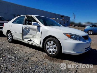 Czwarte zdjęcie samochodu z boku: 2003 TOYOTA CAMRY LE VIN:4T1BE30K13U167375 - miniatura