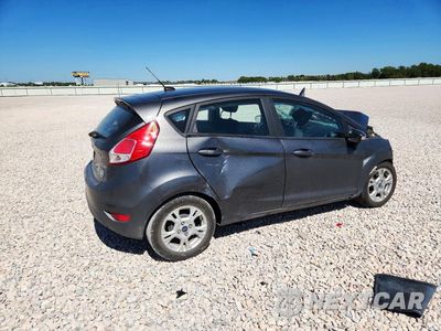 Trzecie zdjęcie samochodu z tyłu: 2016 FORD FIESTA SE VIN:3FADP4EJ1GM119906 - miniatura