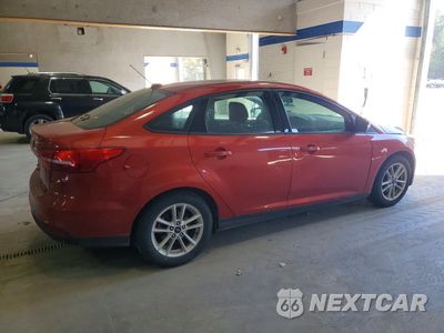 Trzecie zdjęcie samochodu z tyłu: 2018 FORD FOCUS SE VIN:1FADP3FE3JL256883 - miniatura