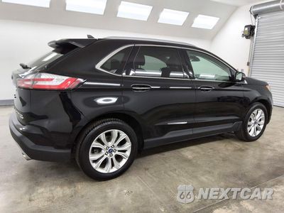 Trzecie zdjęcie samochodu z tyłu: 2020 FORD EDGE TITANIUM VIN:2FMPK3K90LBB47939 - miniatura