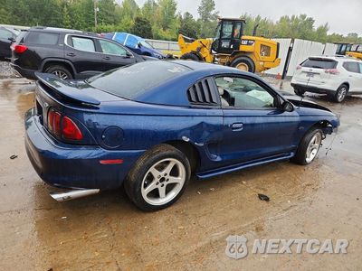Trzecie zdjęcie samochodu z tyłu: 1998 FORD MUSTANG GT VIN:1FAFP42X7WF135592 - miniatura