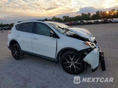 Czwarte zdjęcie samochodu z boku: 2018 TOYOTA RAV4 SE VIN:JTMNFREV5JJ168774 - miniatura