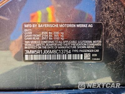 Zdjęcie 12 z 12 samochodu: 2021 BMW 330I VIN:3MW5R1J06M8C13754 - miniatura