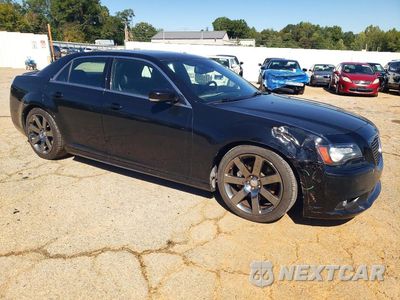 Czwarte zdjęcie samochodu z boku: 2012 CHRYSLER 300 SRT-8 VIN:2C3CCAFJ7CH800857 - miniatura