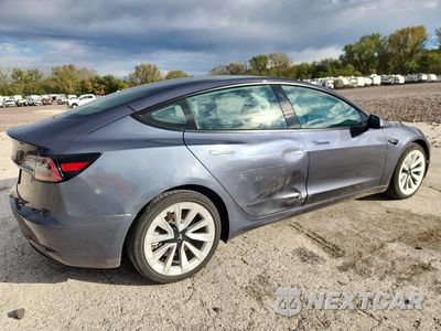Trzecie zdjęcie samochodu z tyłu: 2023 TESLA MODEL 3 VIN:5YJ3E1EA9PF459772 - miniatura