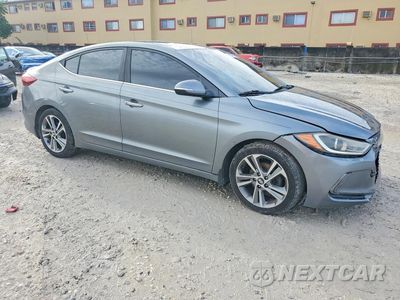 Czwarte zdjęcie samochodu z boku: 2017 HYUNDAI ELANTRA LIMITED VIN:KMHD84LF7HU075991 - miniatura