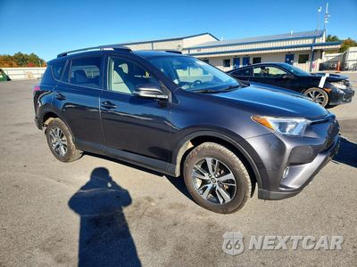 Czwarte zdjęcie samochodu z boku: 2018 TOYOTA RAV4 XLE VIN:JTMRFREV1JJ175285 - miniatura