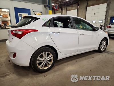 Trzecie zdjęcie samochodu z tyłu: 2014 HYUNDAI ELANTRA GT BASE VIN:KMHD35LHXEU199447 - miniatura