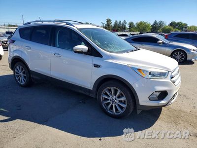 Czwarte zdjęcie samochodu z boku: 2018 FORD ESCAPE TITANIUM VIN:1FMCU9J94JUB19176 - miniatura